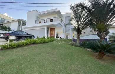 Imagem: A casa em condomínio possui 4 Dormitórios, 5 Banheiros, 360m²