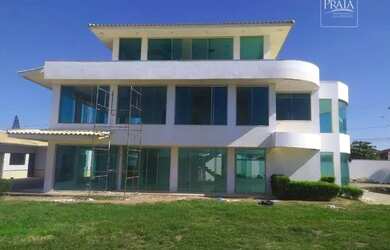 Imagem: A casa possui 4 Dormitórios, 5 Banheiros, 5 Vagas na garagem