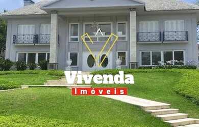 Imagem: A casa em condomínio possui 5 Dormitórios, 5 Banheiros, 5