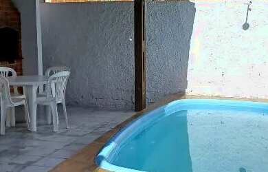 Imagem: A casa possui 3 Dormitórios, 1 Vaga na garagem e está localizado