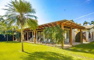 Imagem: A casa possui 5 Dormitórios, 5 Banheiros, 5 Vagas na garagem