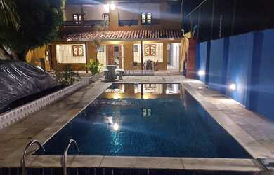 Imagem: A casa possui 5 Dormitórios, 5 Banheiros, 5 Vagas na garagem