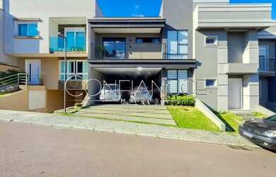 Imagem: A casa em condomínio possui 3 Dormitórios, 4 Banheiros, 2