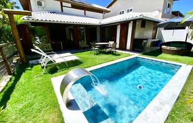 Imagem: A casa possui 3 Dormitórios, 4 Banheiros, 3 Vagas na garagem