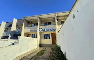 Imagem: A casa possui 2 Dormitórios, 3 Banheiros, 2 Vagas na garagem