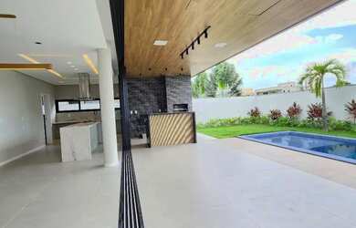 Imagem: A casa em condomínio possui 4 Dormitórios, 4 Banheiros, 4