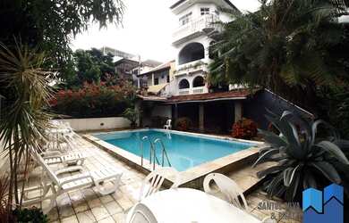 Imagem: A casa possui 5 Dormitórios, 5 Banheiros, 4 Vagas na garagem