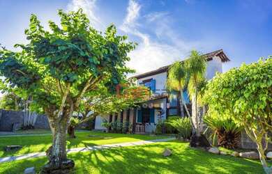 Imagem: A casa em condomínio possui 5 Dormitórios, 5 Banheiros, 3