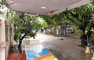 Imagem: A casa possui 4 Dormitórios, 3 Banheiros, 4 Vagas na garagem