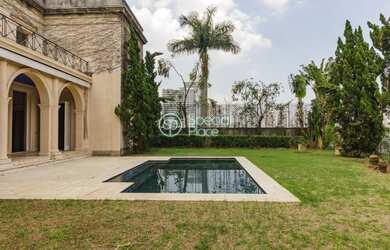 Imagem: A casa possui 4 Dormitórios, 5 Banheiros, 5 Vagas na garagem