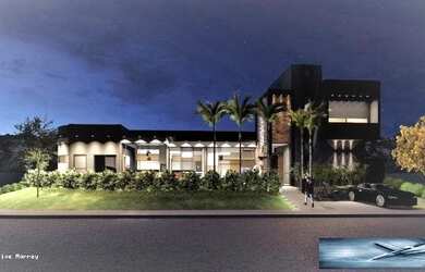 Imagem: A casa possui 4 Dormitórios, 5 Banheiros, 4 Vagas na garagem