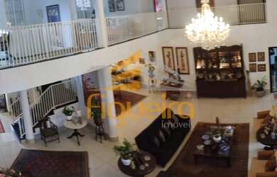 Imagem: A casa possui 5 Dormitórios, 5 Banheiros, 5 Vagas na garagem