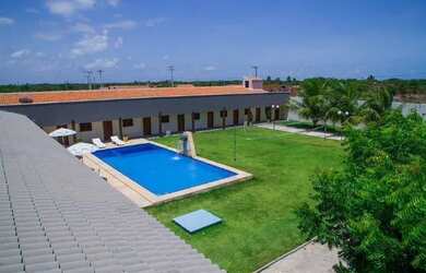 Imagem: A casa possui 5 Dormitórios, 5 Vagas na garagem e está localizado