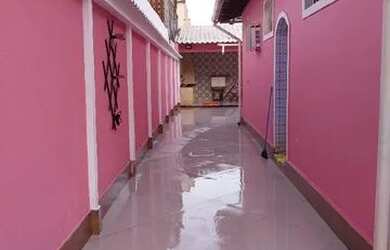 Imagem: A casa possui 4 Dormitórios, 4 Banheiros, 5 Vagas na garagem