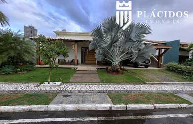 Imagem: A casa possui 4 Dormitórios, 5 Banheiros, 2 Vagas na garagem