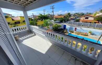 Imagem: A casa possui 5 Dormitórios, 5 Banheiros, 4 Vagas na garagem