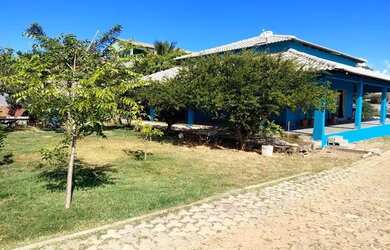 Imagem: A casa em condomínio possui 4 Dormitórios, 2 Banheiros, 400m²