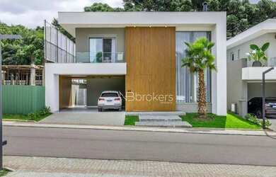 Imagem: A casa em condomínio possui 4 Dormitórios, 5 Banheiros, 3