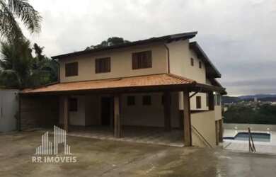 Imagem: A casa possui 5 Dormitórios, 5 Banheiros, 5 Vagas na garagem