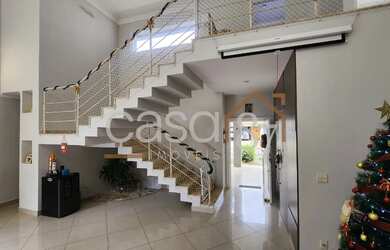 Imagem: A casa em condomínio possui 4 Dormitórios, 4 Banheiros, 4