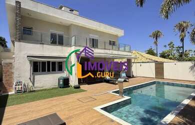 Imagem: A casa em condomínio possui 4 Dormitórios, 5 Banheiros, 4