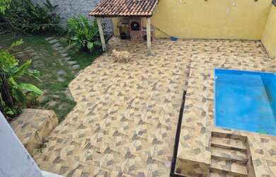 Imagem: A casa possui 3 Dormitórios, 2 Banheiros, 1 Vaga na garagem