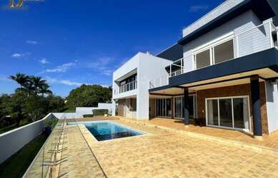 Imagem: A casa possui 5 Dormitórios, 5 Banheiros, 5 Vagas na garagem