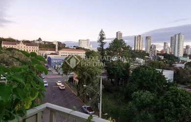 Imagem: O apartamento possui 3 Dormitórios, 1 Banheiro, 1 Vaga na garagem