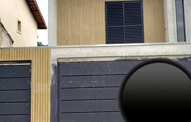 Imagem: A casa possui 3 Dormitórios, 4 Banheiros, 2 Vagas na garagem