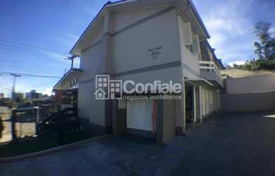 Imagem: A casa possui 3 Dormitórios, 2 Banheiros, 3 Vagas na garagem