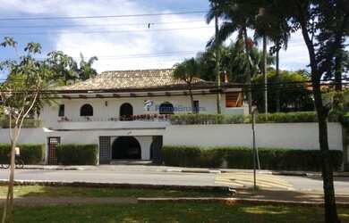 Imagem: A casa possui 5 Dormitórios, 5 Banheiros, 5 Vagas na garagem