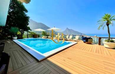 Imagem: A casa em condomínio possui 5 Dormitórios, 5 Banheiros, 5