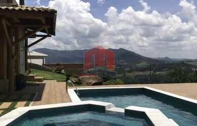 Imagem: A casa possui 5 Dormitórios, 5 Banheiros, 5 Vagas na garagem