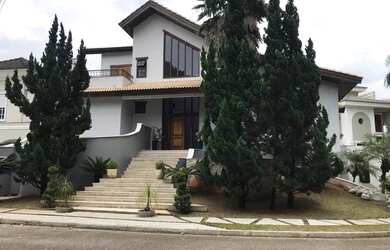 Imagem: A casa em condomínio possui 5 Dormitórios, 5 Banheiros, 5