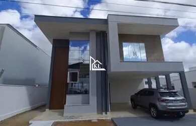 Imagem: A casa possui 4 Dormitórios, 4 Banheiros, 4 Vagas na garagem