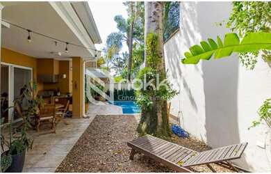 Imagem: A casa em condomínio possui 4 Dormitórios, 5 Banheiros, 4