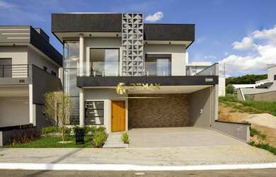 Imagem: A casa possui 3 Dormitórios, 3 Banheiros, 2 Vagas na garagem