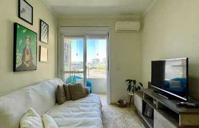 Imagem: O apartamento possui 1 Dormitório, 1 Banheiro, 1 Vaga na garagem