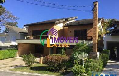 Imagem: A casa em condomínio possui 4 Dormitórios, 5 Banheiros, 2