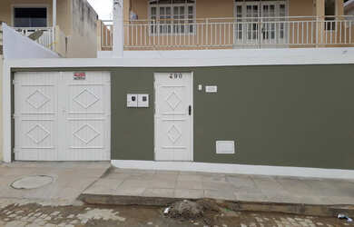 Imagem: A casa possui 4 Dormitórios, 2 Banheiros, 4 Vagas na garagem