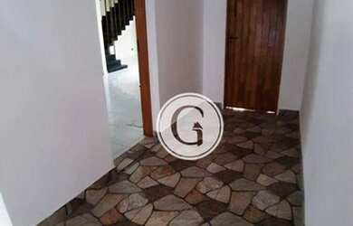 Imagem: A casa possui 3 Dormitórios, 5 Banheiros, 4 Vagas na garagem