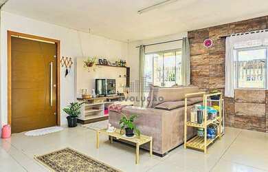 Imagem: A casa possui 2 Dormitórios, 1 Banheiro, 1 Vaga na garagem