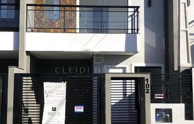 Imagem: A casa possui 2 Dormitórios, 3 Banheiros, 1 Vaga na garagem