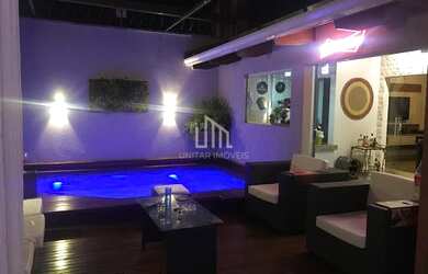 Imagem: A casa possui 2 Dormitórios, 3 Banheiros, 2 Vagas na garagem