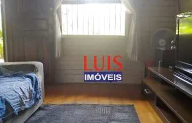 Imagem: A casa possui 3 Dormitórios, 2 Banheiros, 2 Vagas na garagem