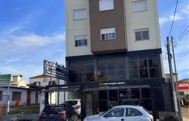 Imagem: O apartamento possui 1 Dormitório, 1 Banheiro, 1 Vaga na garagem