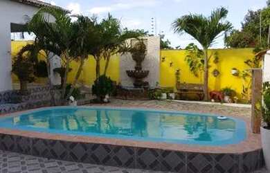 Imagem: A casa possui 2 Dormitórios e 2 Banheiros e está localizado