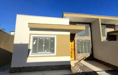 Imagem: A casa possui 3 Dormitórios, 2 Banheiros, 1 Vaga na garagem