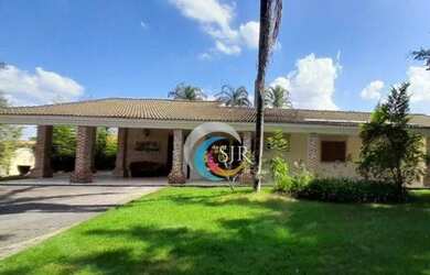 Imagem: A casa em condomínio possui 4 Dormitórios, 5 Banheiros, 5