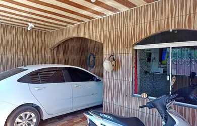 Imagem: A casa possui 2 Dormitórios, 1 Banheiro, 1 Vaga na garagem